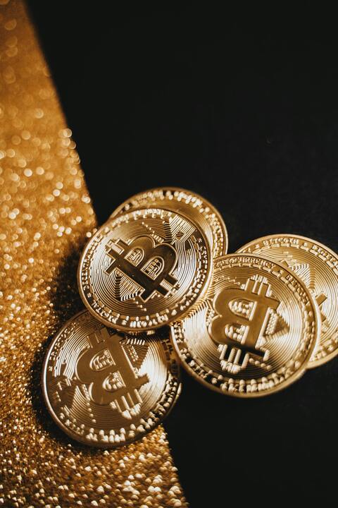 Bitcoin gold coins closeup — Georgia Crypto License: NBG VASP & Virtual Zone 2026