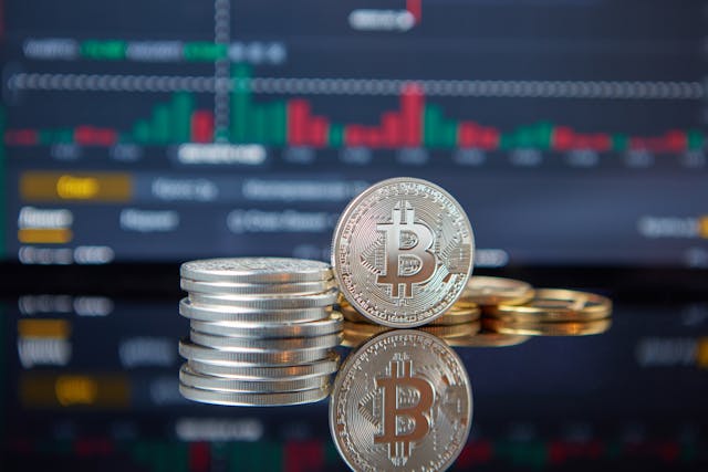 Bitcoin silver coin stacks chart reflection — Georgia Crypto License: NBG VASP & Virtual Zone 2026