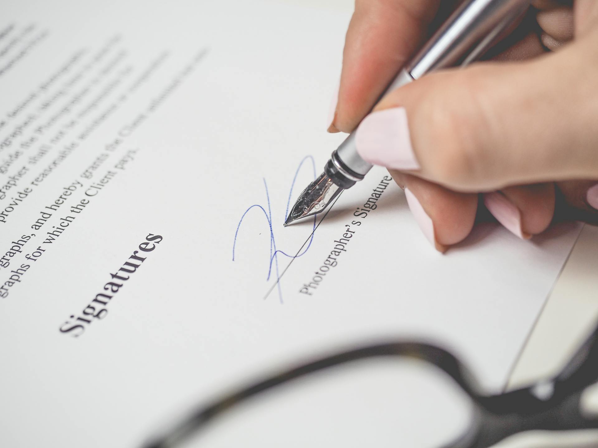 Contract signing fountain pen — RAK DAO License 2026: The World's First DAO & Web3 Free Zone