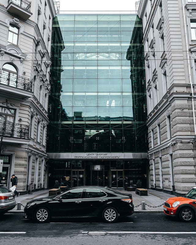 Modern office building glass facade — Singapore Crypto Regulation 2026: MAS DPT License & Asia