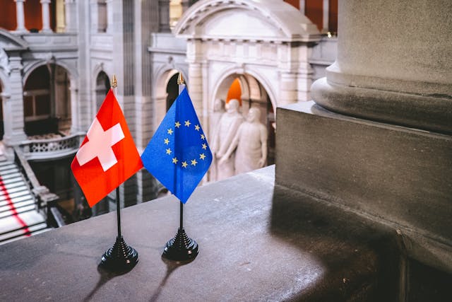 Switzerland eu miniature flags parliament table — South Korea Crypto License: FSC VASP & ISMS 2026