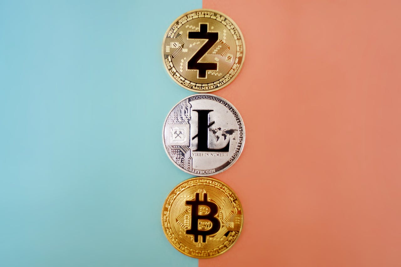 Zcash litecoin bitcoin coins colored background — El Salvador Crypto License 2026: CNAD Digital Asset Registra