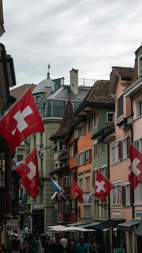 Zurich old town street swiss flags — European Crypto Licences 2026 — Complete MiCA & VA